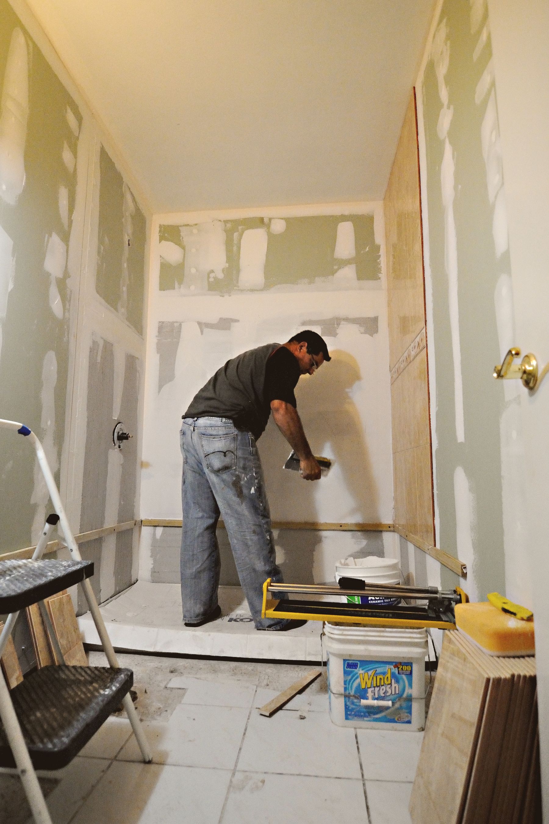 Bathroom renovation with drywall work underway